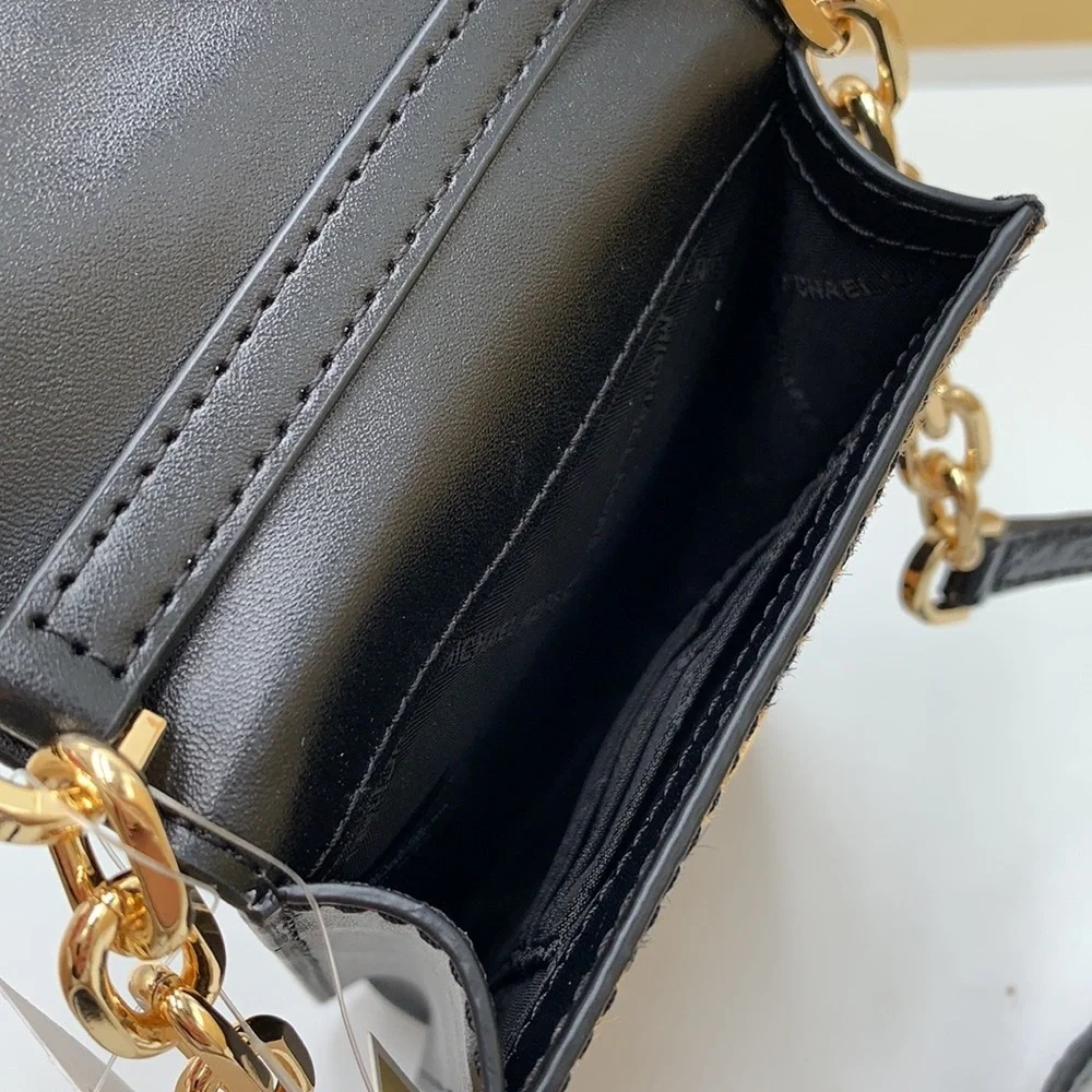 Brand New with Tag
Michael Kors Carmen Small NS Phone XBODY HairCalf
Black Multi - Picture 9 of 16